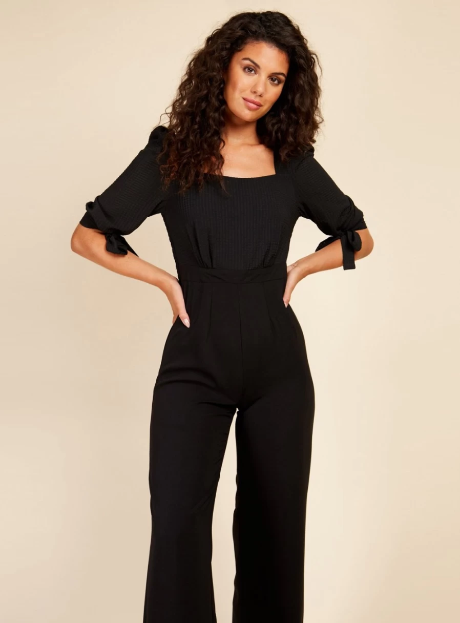 Little Mistress Women's Black Seersucker Jumpsuit - Size 8 | Stylish Summer Romper