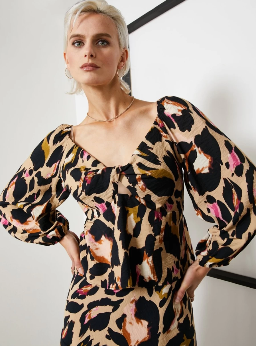 "For All The Love Women's Leopard Print Twist Front T-Shirt | Stylish Animal Print Top"